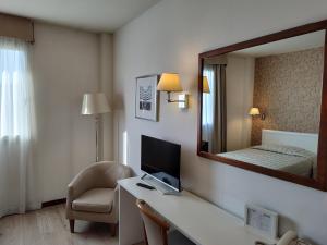 TV o dispositivi per l'intrattenimento presso Hotel Datini