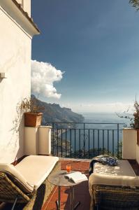 a balcony with a view of the ocean at Villa Margherita by Belmond in Ravello