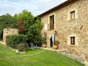 Zahrada ubytování Turisme Rural - Mas Vilà - Monells + 37 fotografií