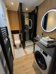 Kúpeľňa v ubytovaní Magnifique 3 étoiles en hyper centre avec place privée + 21 fotografií