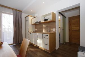 Kuchyň nebo kuchyňský kout v ubytování Gästehaus Steinerhof