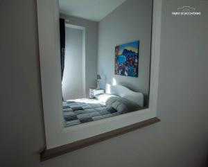 A bed or beds in a room at Ciuri Ciuri B&B