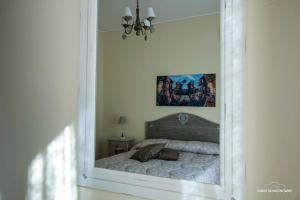 A bed or beds in a room at Ciuri Ciuri B&B
