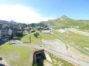 an aerial view of a park with mountains in the background at Appartement Arette, 2 pièces, 6 personnes - FR-1-602-83 in Arette