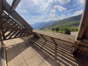 a view from the balcony of a house with a view of mountains at Studio 4 pers avec balcon, Piau-Engaly - FR-1-457-297 in Aragnouet +3 photos