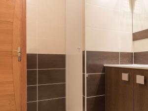 a bathroom with a shower with a glass door at Appartement Briançon, 2 pièces, 4 personnes - FR-1-330C-58 in Briançon