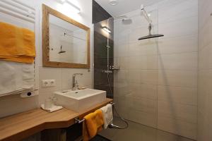 Koupelna v ubytování Gästehaus Steinerhof + 37 fotografií