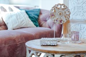 a coffee table with a balloon on top of it at Spa Residence Seibold in Waldkirchen