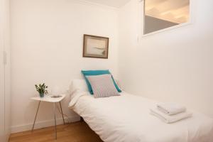 Postel nebo postele na pokoji v ubytování Click&Flat Stylish Torrijos
