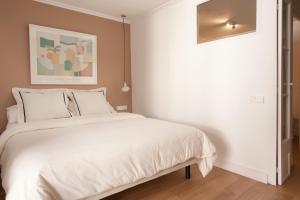 Postel nebo postele na pokoji v ubytování Click&Flat Stylish Torrijos