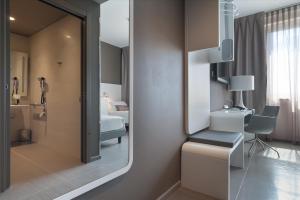 Rúm í herbergi á 8Piuhotel +37 myndir