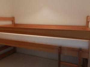 Ένα ή περισσότερα κρεβάτια σε δωμάτιο στο Appart 2 pièces avec balcon, proche pistes, animaux admis - FR-1-557A-25