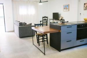 Kuchyňa alebo kuchynka v ubytovaní Biznaga House, loft privado e independiente