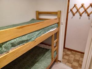 a couple of bunk beds in a room at Appartement Le Biot, 2 pièces, 6 personnes - FR-1-573-56 in Le Biot