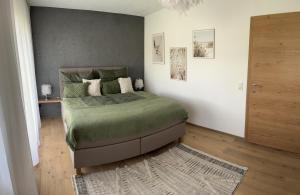 Postel nebo postele na pokoji v ubytování Ferienwohnung Dahoam