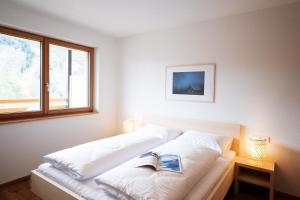 Posteľ alebo postele v izbe v ubytovaní Landhaus Damüls - 06