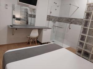 Koupelna v ubytování Apartamentos Rous - Solo adultos