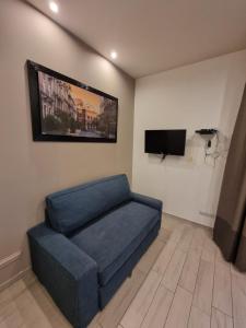 A television and/or entertainment centre at GG apartaments