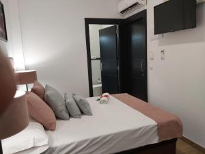 Postel nebo postele na pokoji v ubytování Apartamentos Rous - Solo adultos