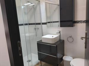Koupelna v ubytování Apartamentos Rous - Solo adultos