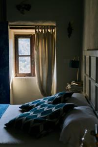 Ένα ή περισσότερα κρεβάτια σε δωμάτιο στο Opera Suites - Le notti bianche