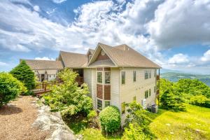 a house on the side of a mountain at Views for Miles at the Reserve in Sugar Mountain