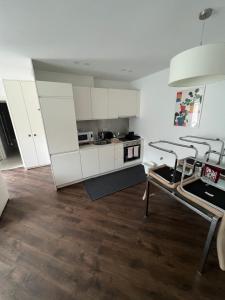Kuchyň nebo kuchyňský kout v ubytování Erkel Rooftop Suites