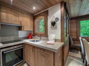 a kitchen with a sink and a counter top at Chalet Méribel, 8 pièces, 10 personnes - FR-1-565-65 in Les Allues