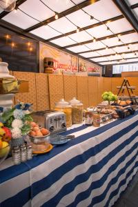a blue and white table with food on it at Hotel Scherman in New York