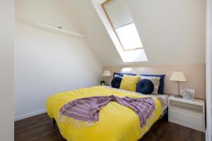 Postel nebo postele na pokoji v ubytování Erkel Rooftop Suites