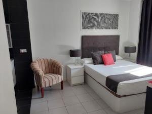 Postel nebo postele na pokoji v ubytování Apartamentos Rous - Solo adultos