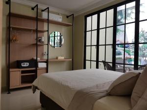 מיטה או מיטות בחדר ב-Danka@tudor residence