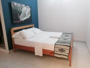 Postel nebo postele na pokoji v ubytování Hotel Casa de las Dos Palmas -Hotel Boutique