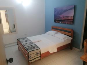 Postel nebo postele na pokoji v ubytování Hotel Casa de las Dos Palmas -Hotel Boutique