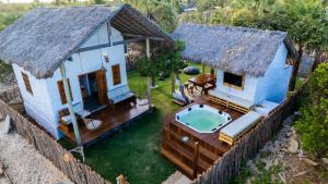 an aerial view of a house with a swimming pool at Casa Mangue in Macapá