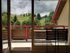 Balkón nebo terasa v ubytování Appartement Pratique avec Balcon et Garage Privatif à Villard-de-Lans - FR-1-548-10