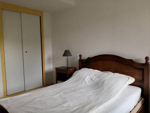 Postel nebo postele na pokoji v ubytování Appartement Pratique avec Balcon et Garage Privatif à Villard-de-Lans - FR-1-548-10 + 2 fotografie