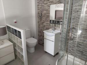 Koupelna v ubytování Apartamentos Rous - Solo adultos