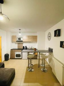 Кухня или мини-кухня в Les docks libres sud
