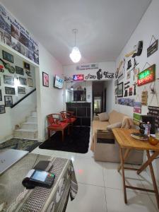 Et tv og/eller underholdning på Pousada Cantinho da Família