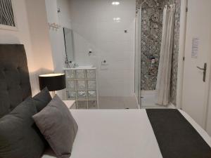 Postel nebo postele na pokoji v ubytování Apartamentos Rous - Solo adultos