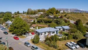an aerial view of a house with a parking lot at Mountain View Backpackers in Wanaka