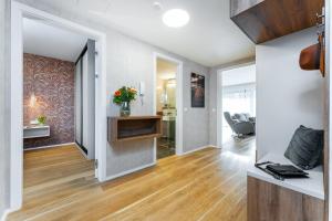 TV a/nebo společenská místnost v ubytování Apartament I313 Molo Lipno with private wellness