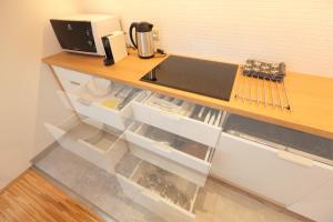 Köök või kööginurk majutusasutuses Apartmány U Květné zahrady