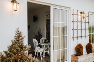 Balkón alebo terasa v ubytovaní HACIENDA & Królicza Nora