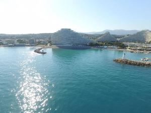 an aerial view of a large body of water with buildings at Appartement Villeneuve-Loubet, 2 pièces, 4 personnes - FR-1-252A-28 in Villeneuve-Loubet