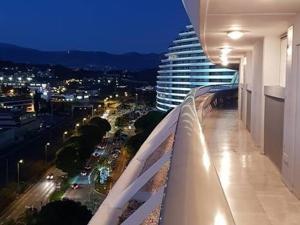 a view of a city at night from a building at Appartement Villeneuve-Loubet, 2 pièces, 4 personnes - FR-1-252A-28 in Villeneuve-Loubet