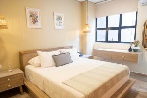 Postel nebo postele na pokoji v ubytování Mythical Hotel Boutique