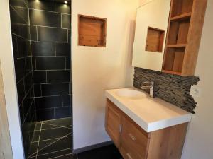 a bathroom with a sink and a shower at Chalet Arêches-Beaufort, 4 pièces, 8 personnes - FR-1-342-208 in Beaufort