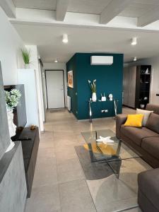Posedenie v ubytovaní "I MORI LUXORY APARTMENTS" - Attico mansardato con incantevole vista mare